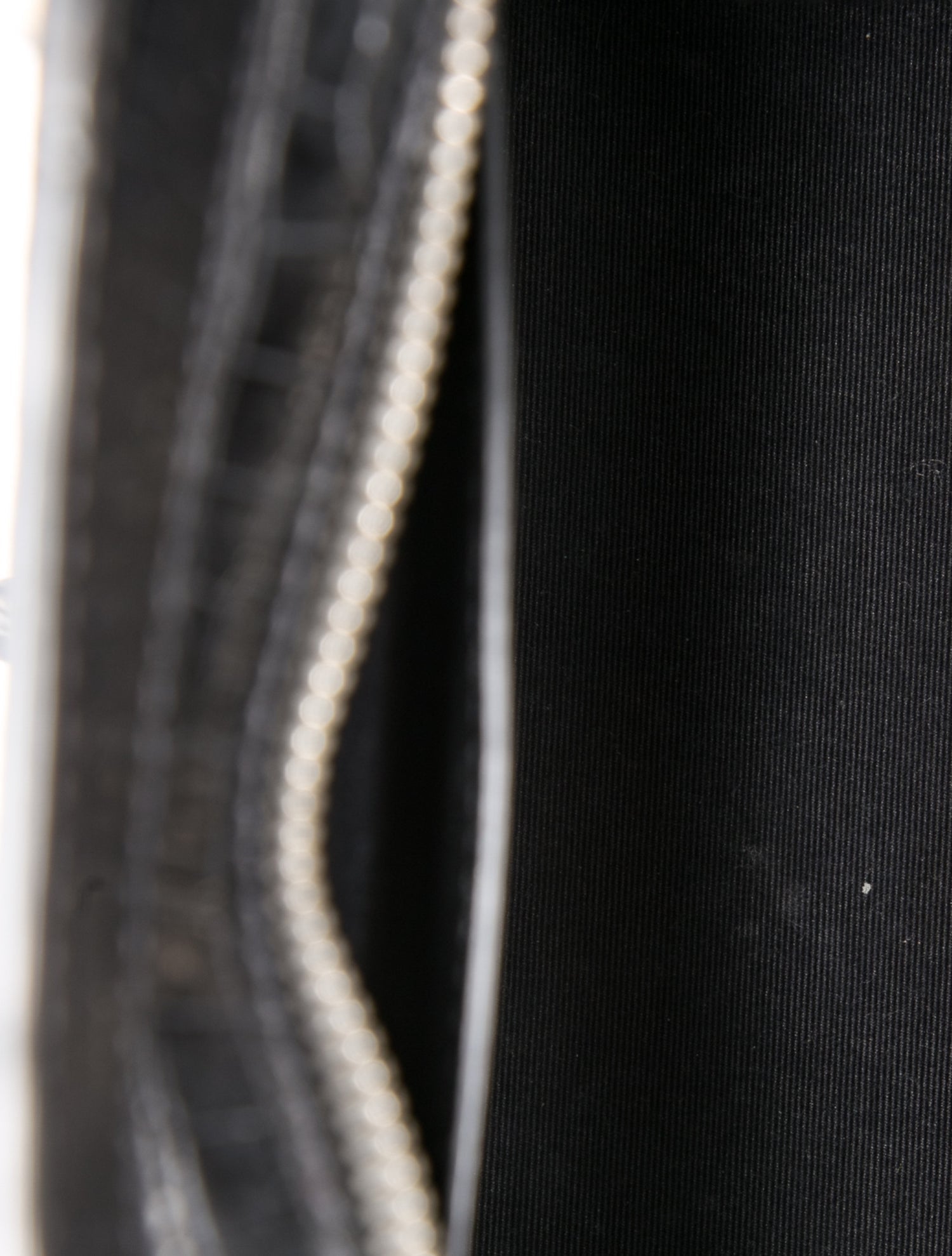 Saint Laurent Embossed Leather Uptown